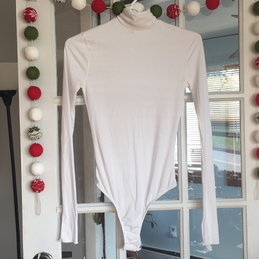 White long sleeve body suit. Free people XS